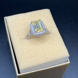 Stunning canary yellow moissanite emerald cut ring